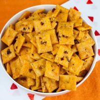 Cheez-Its in a white bowl on the table