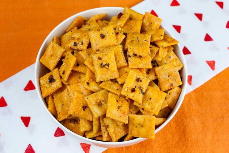 Cheez-Its in a white bowl on the table