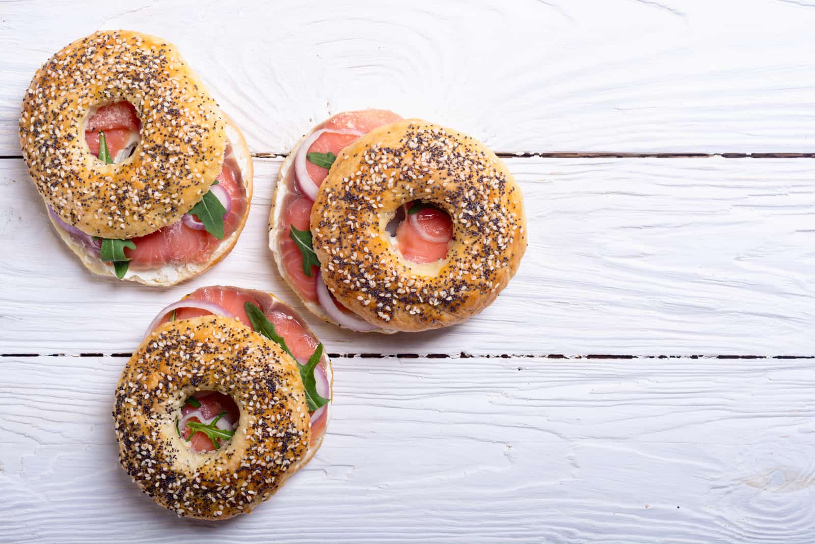 Homemade bagels with salmon and onion