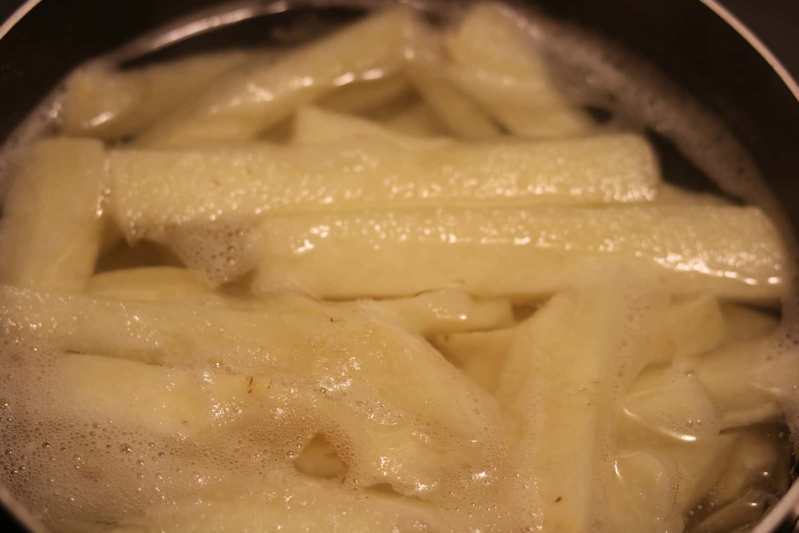 cooked jicama in a pan