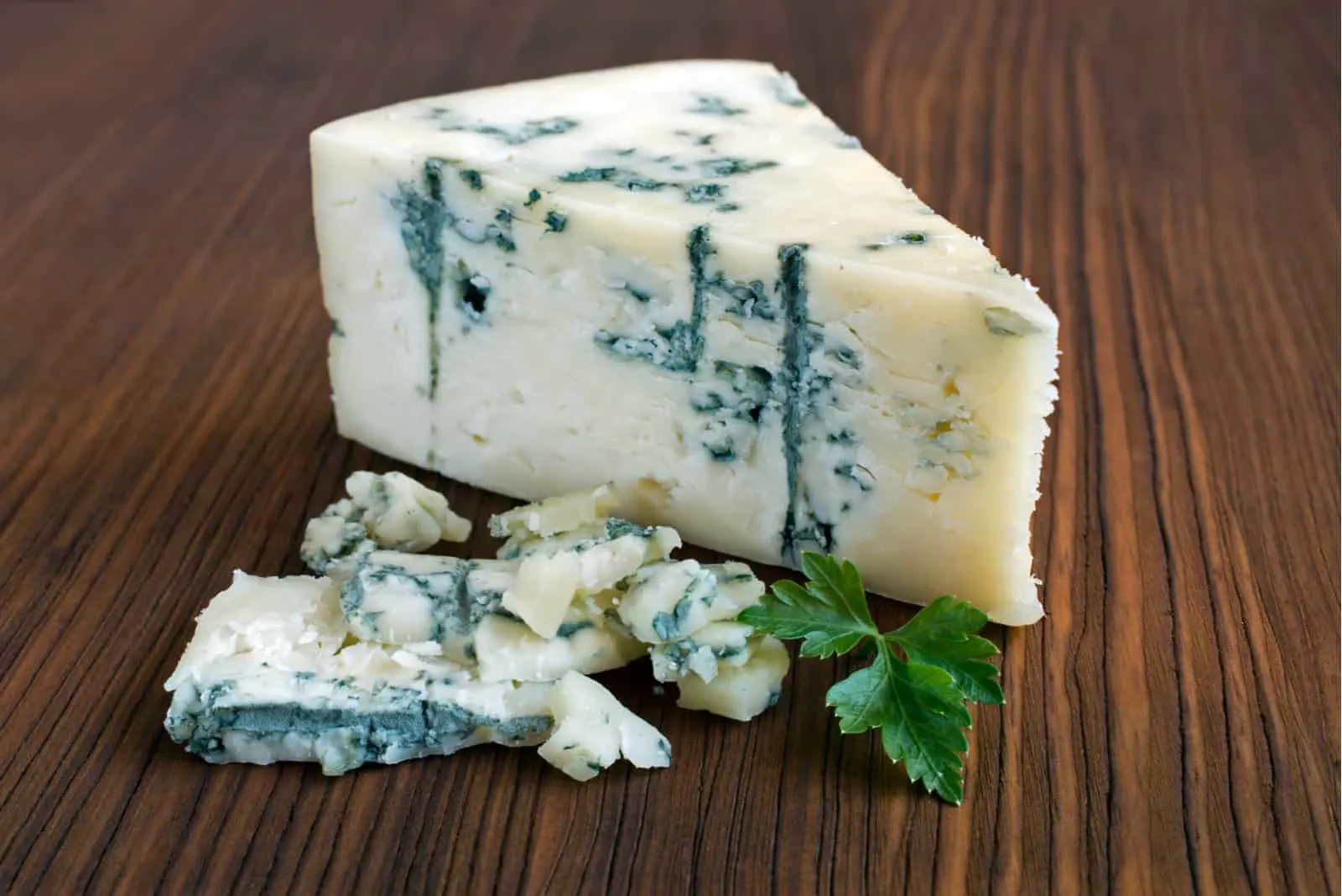 Blue cheese on wooden table