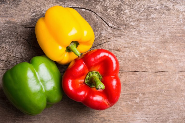 Green , yellow and red bell pepper