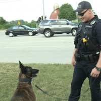 Officers Rescue A Dog From A Burning House