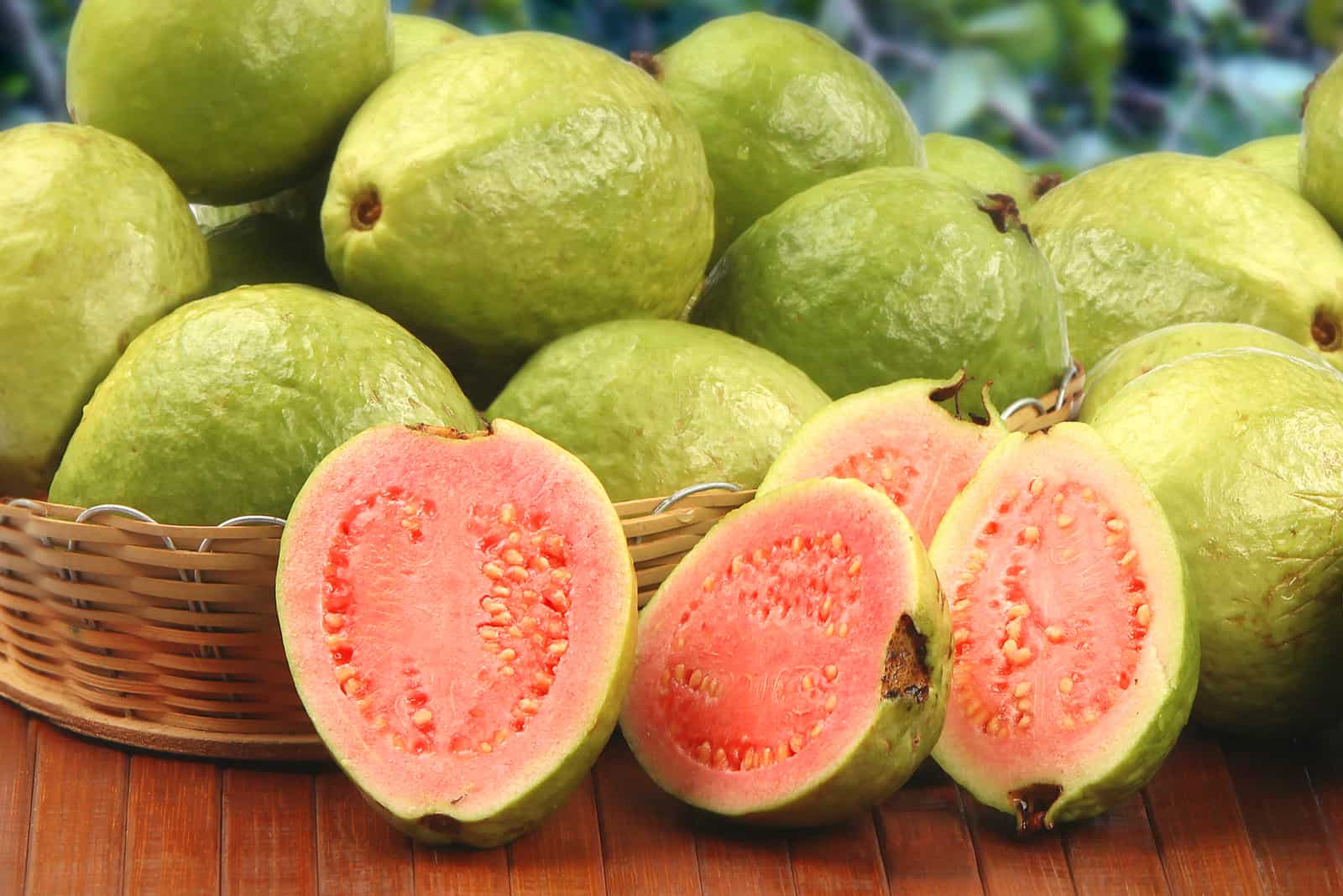 a basket full of fresh guavas