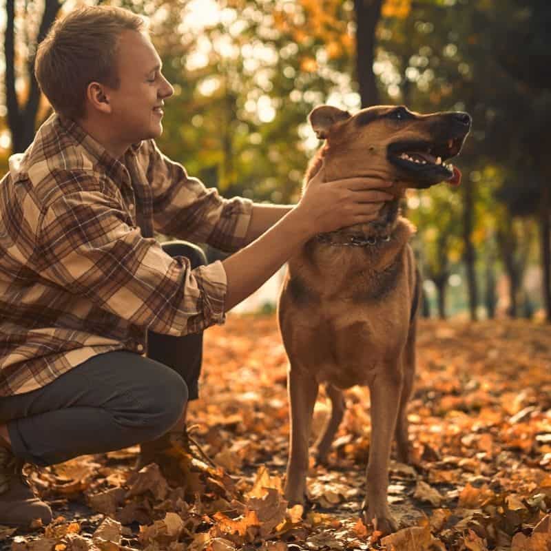 james davis with his dog in nature