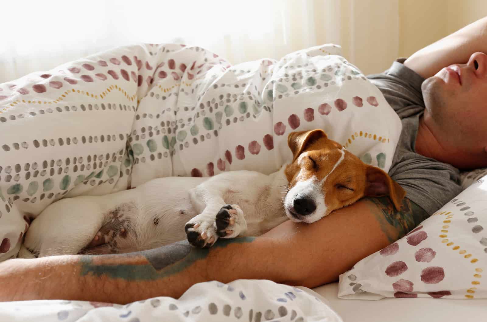 owner and dog sleeping