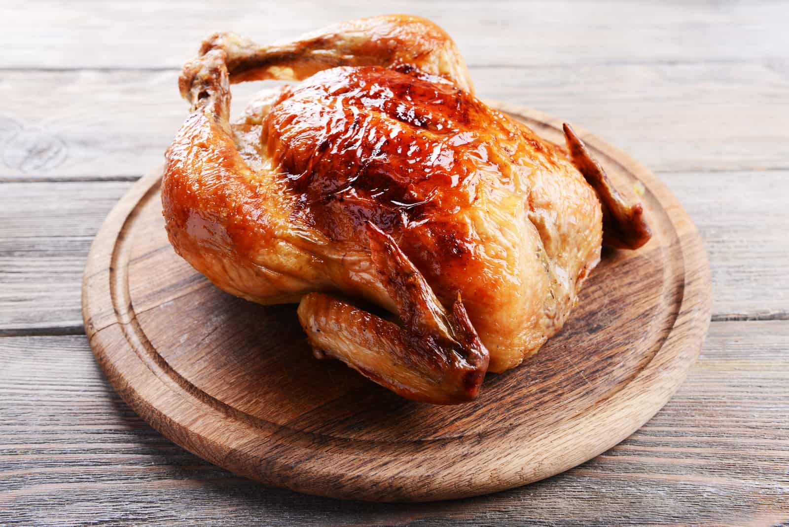 baked chicken on cutting board