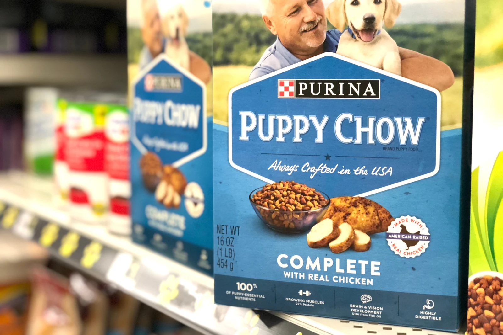 boxes of Purina puppy chow brand dog food