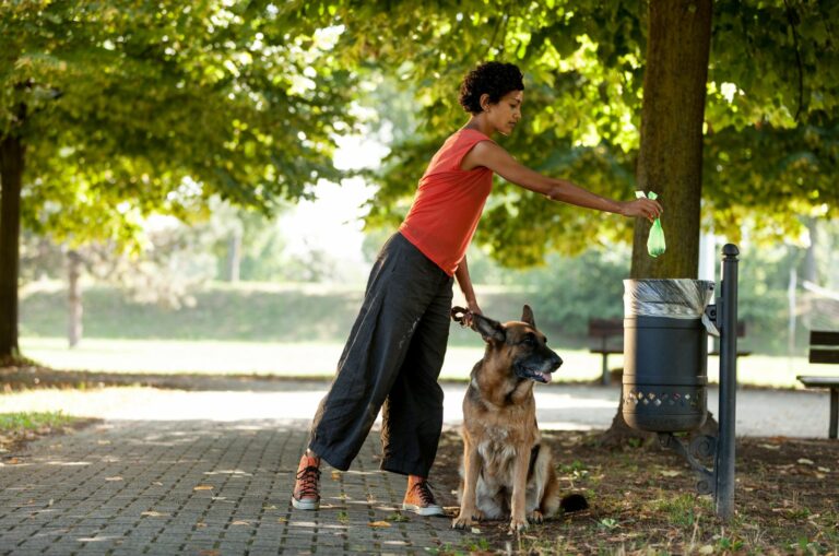 woman and dog in aprk