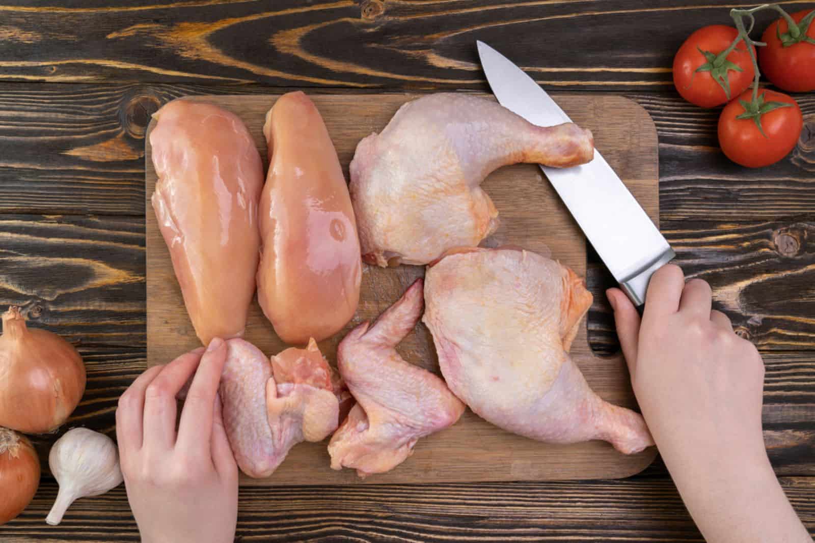 chef preparing chicken meat