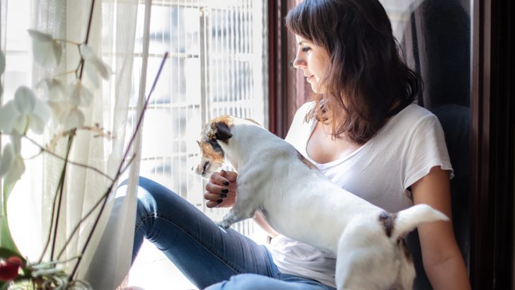 Why Does My Dog Stand On Me: 10 Possible Reasons