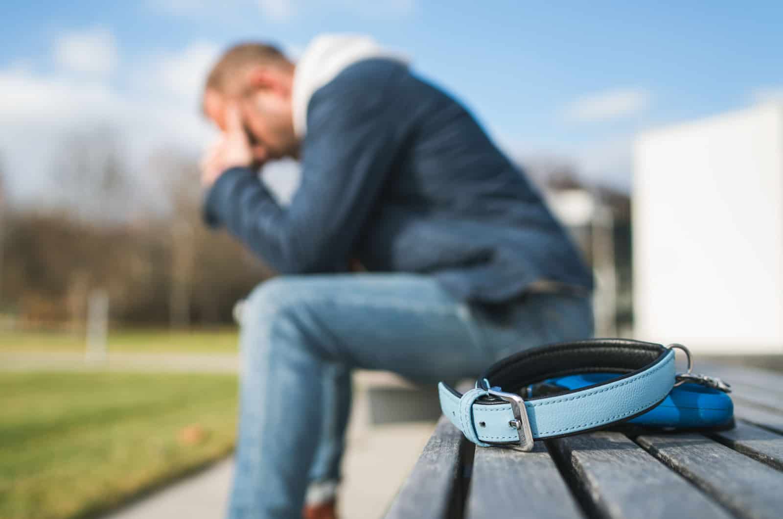 man grieving the loss of his dog