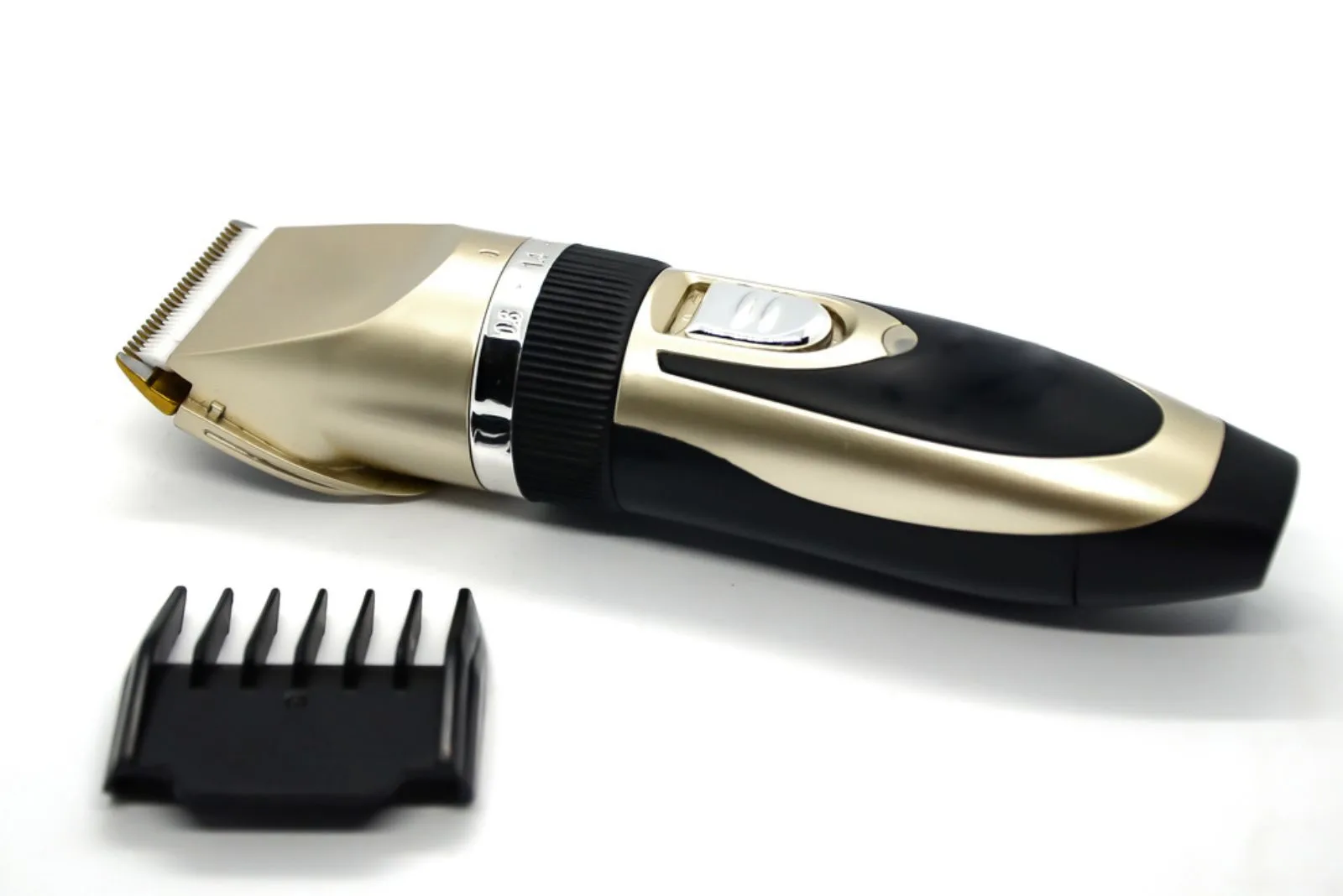 Electric pet clipper with plastic nozzle on a white background