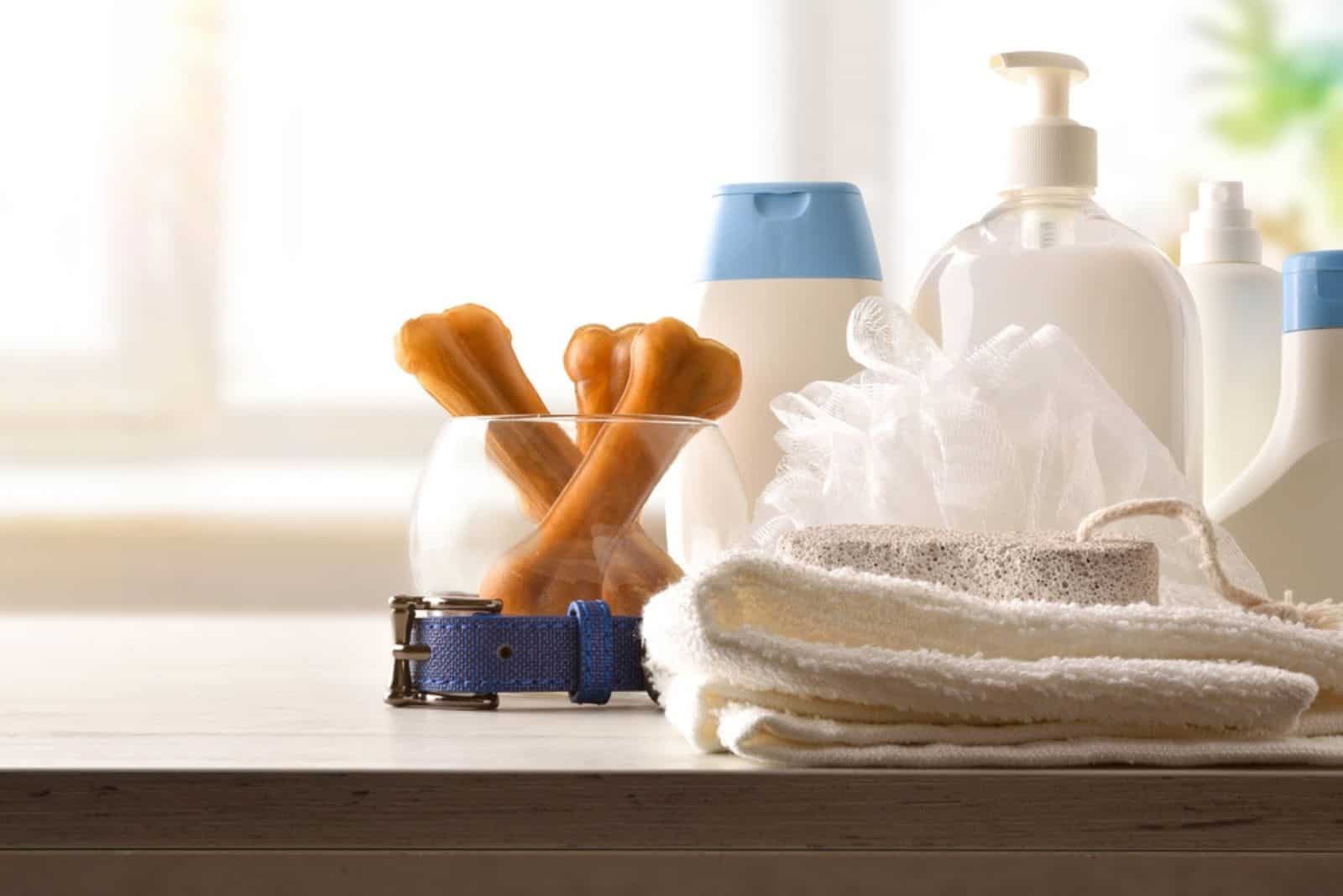 Dog bath products on wooden cabinet 