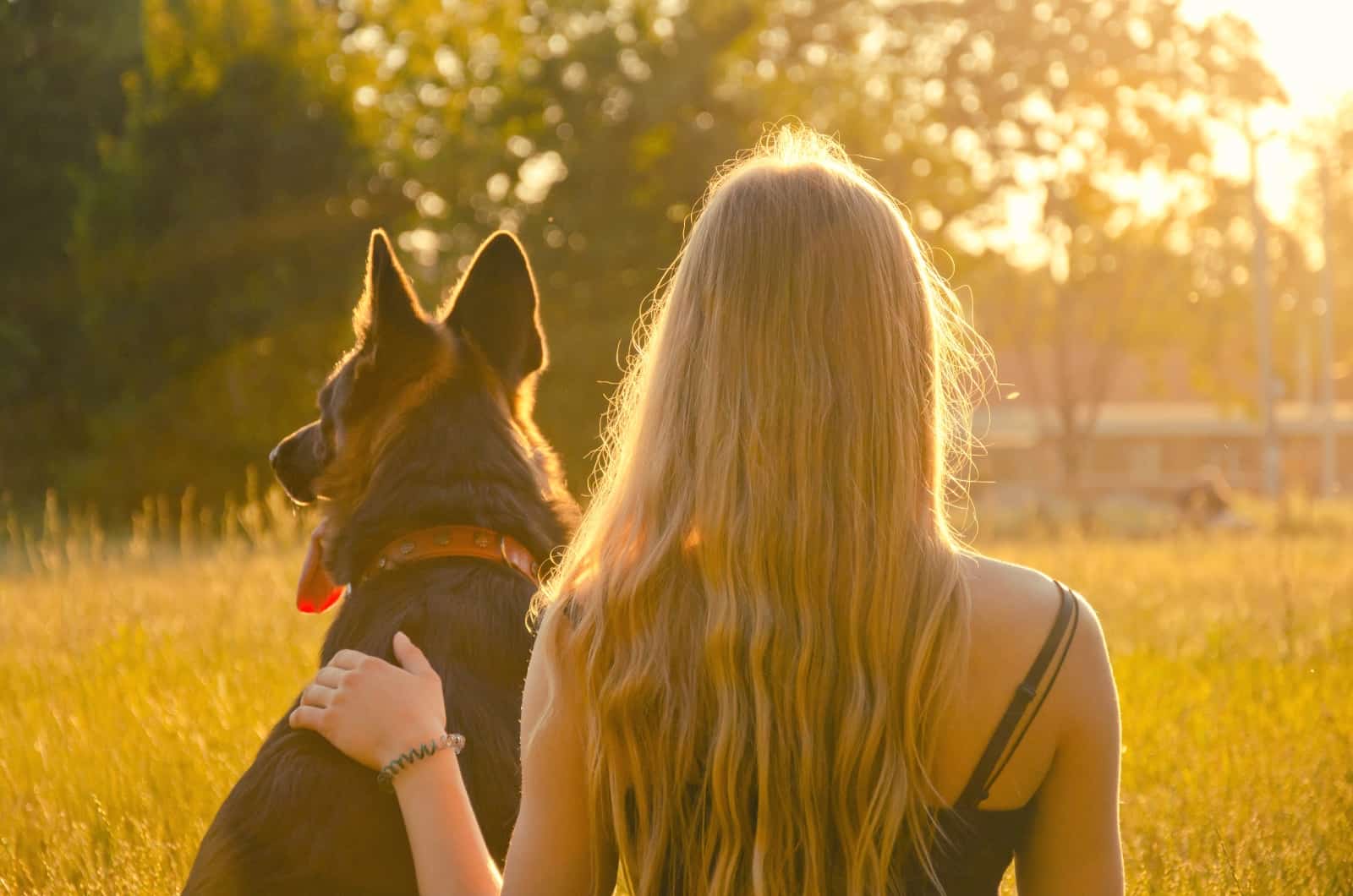 girl and her German Shepherd