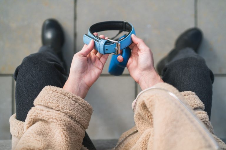 grieving owner holding the lovely pet collar
