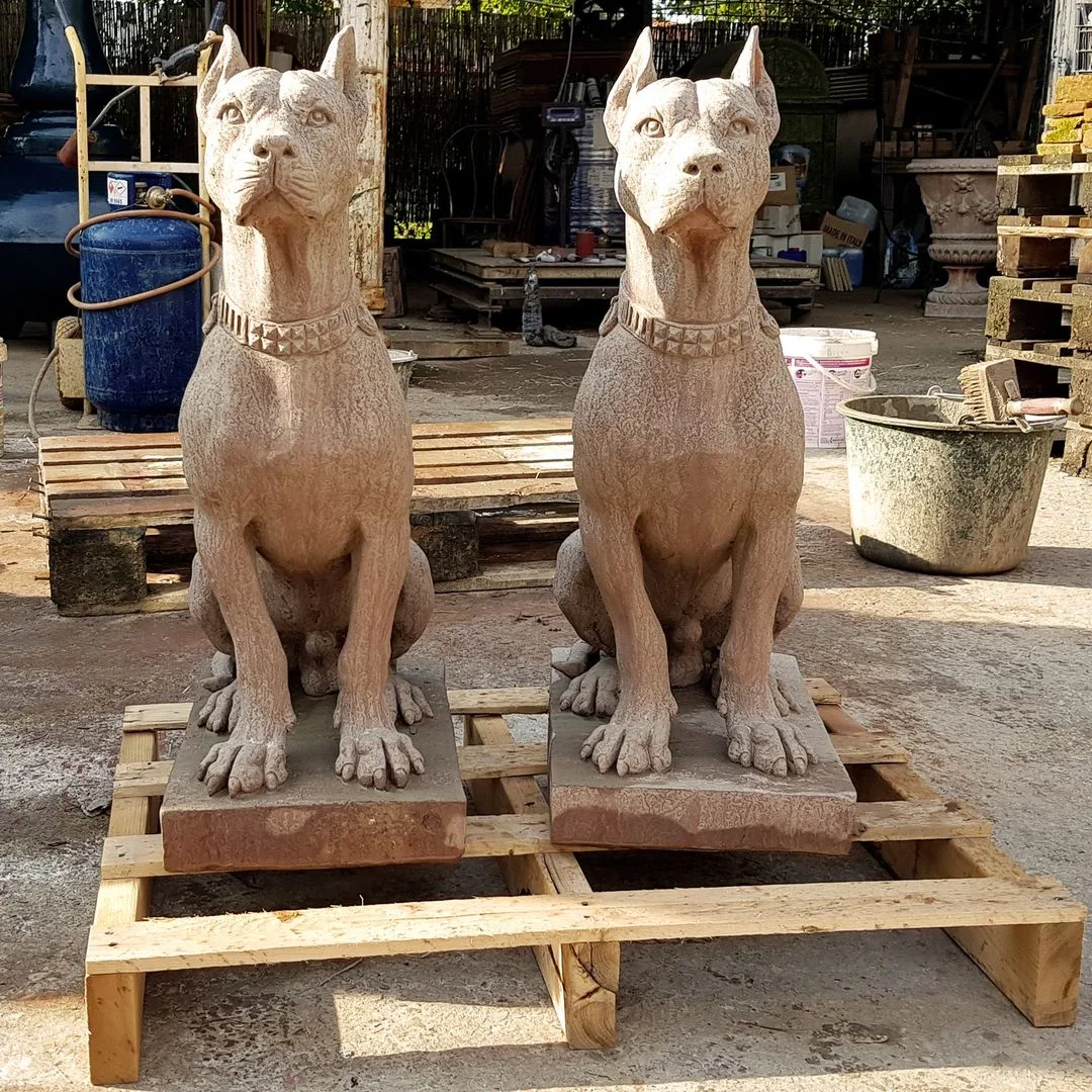 statue of two molossus dogs