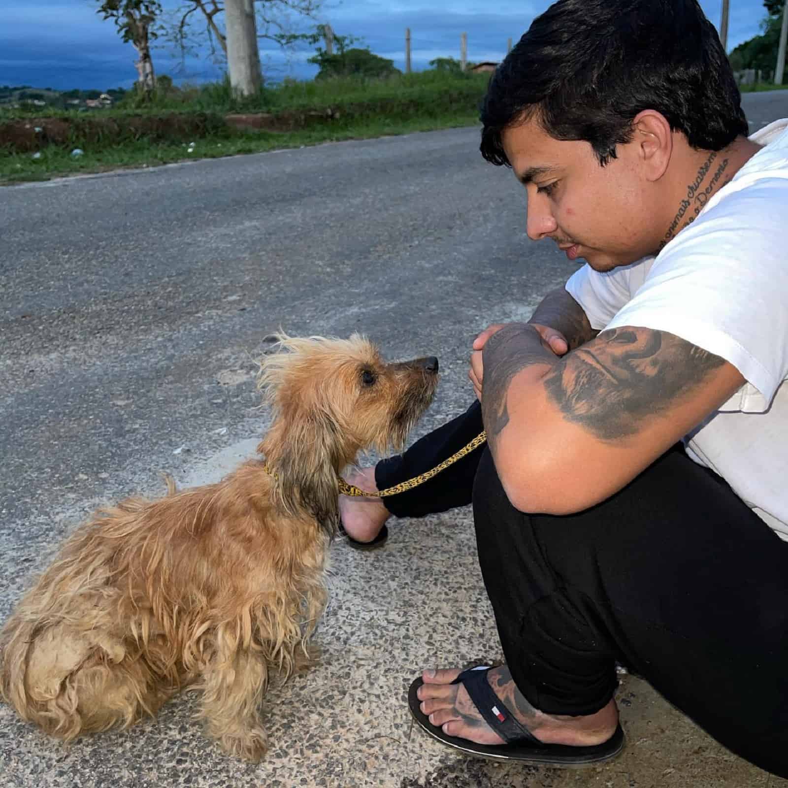 man and dog on the street