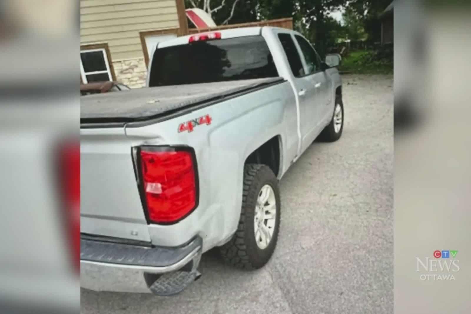 white truck in front of house