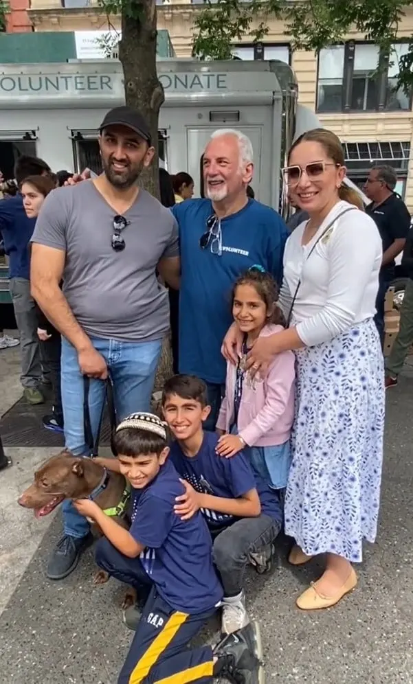 photo of the family with their reunited dog