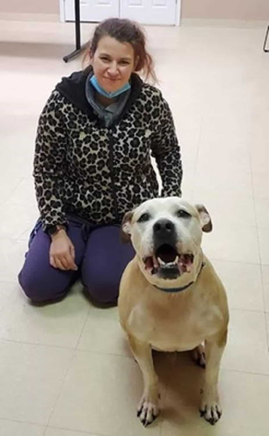 woman with her dog after reunion