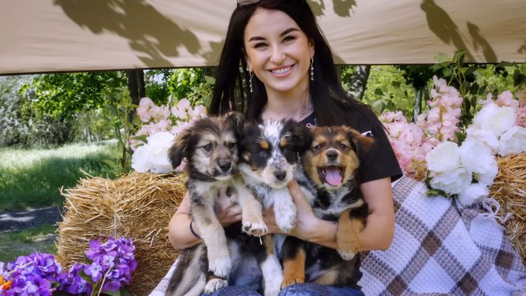 woman with puppies