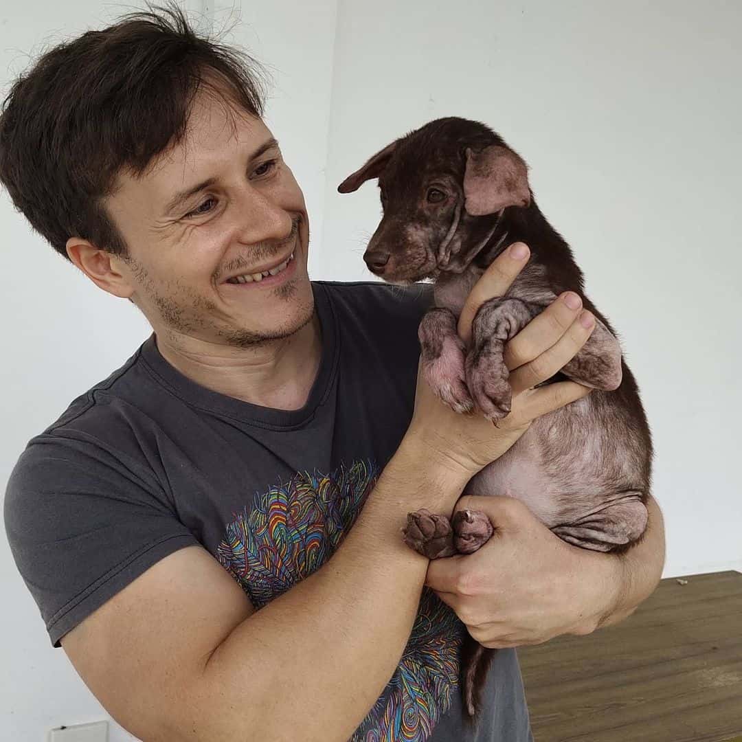 tilly the anemic puppy with her rescuer