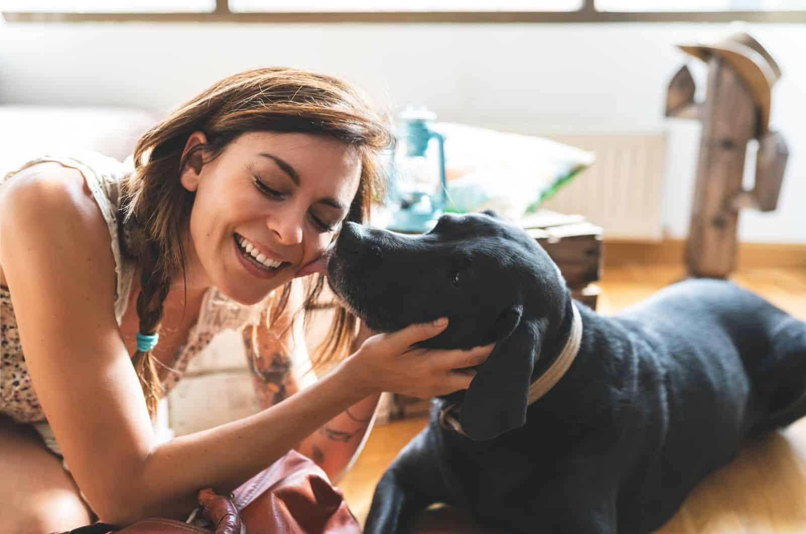 dog kissing woman