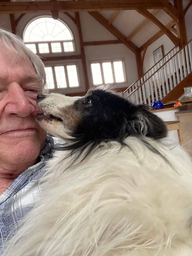 dog licking his new owner