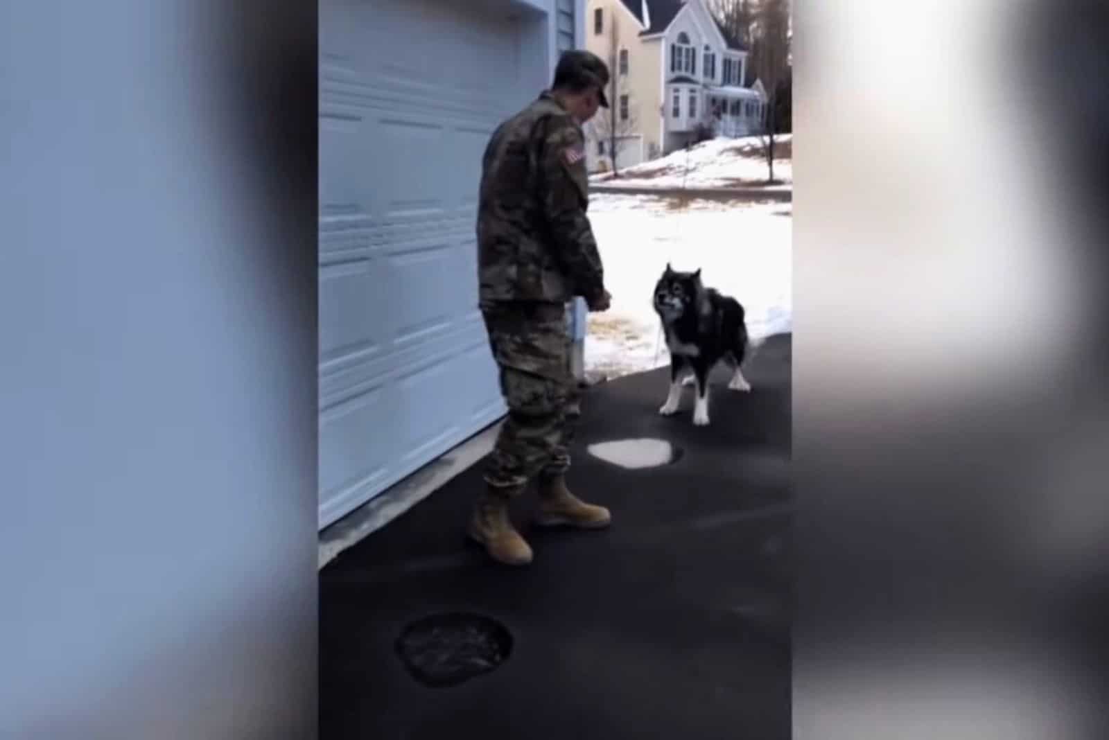 soldier and dog reunited