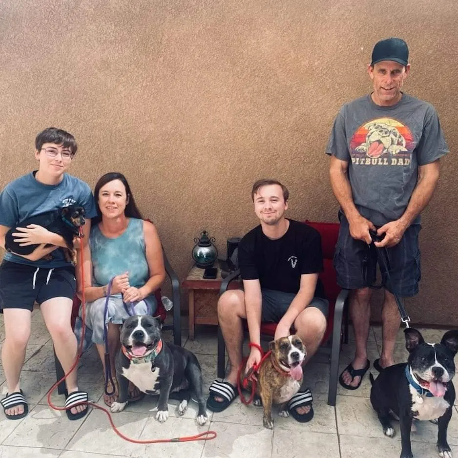 family with adopted dogs