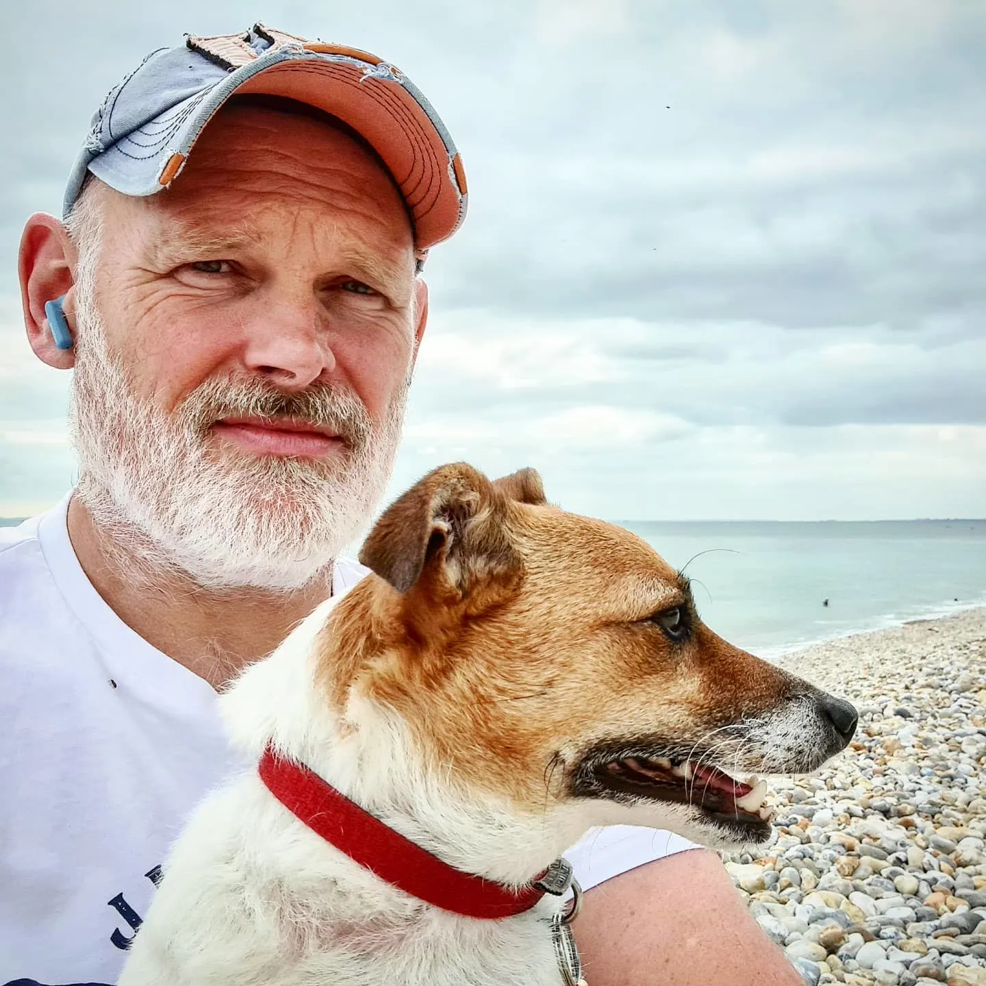 photo of man  and a dog