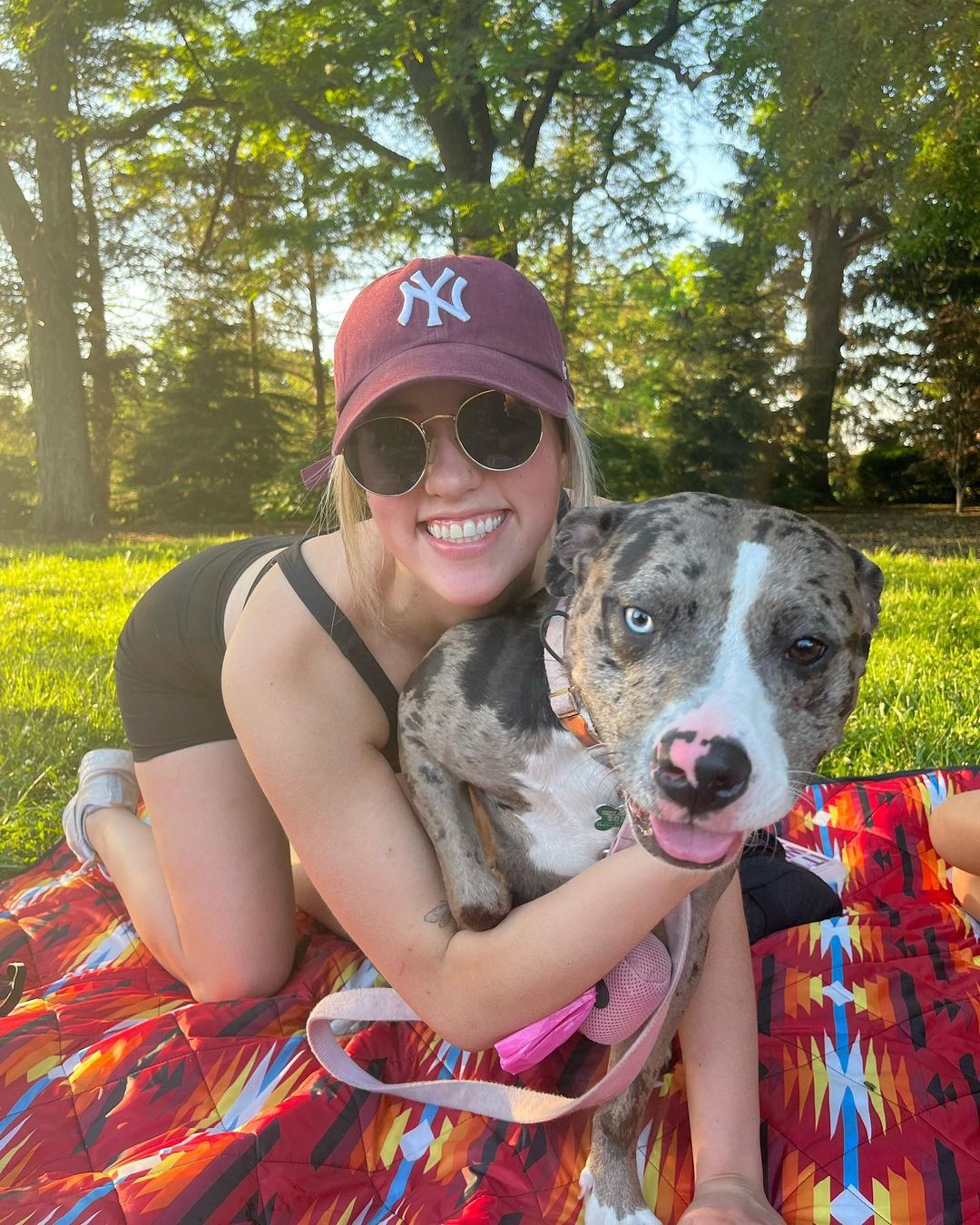 dog named margot with her owner in the park