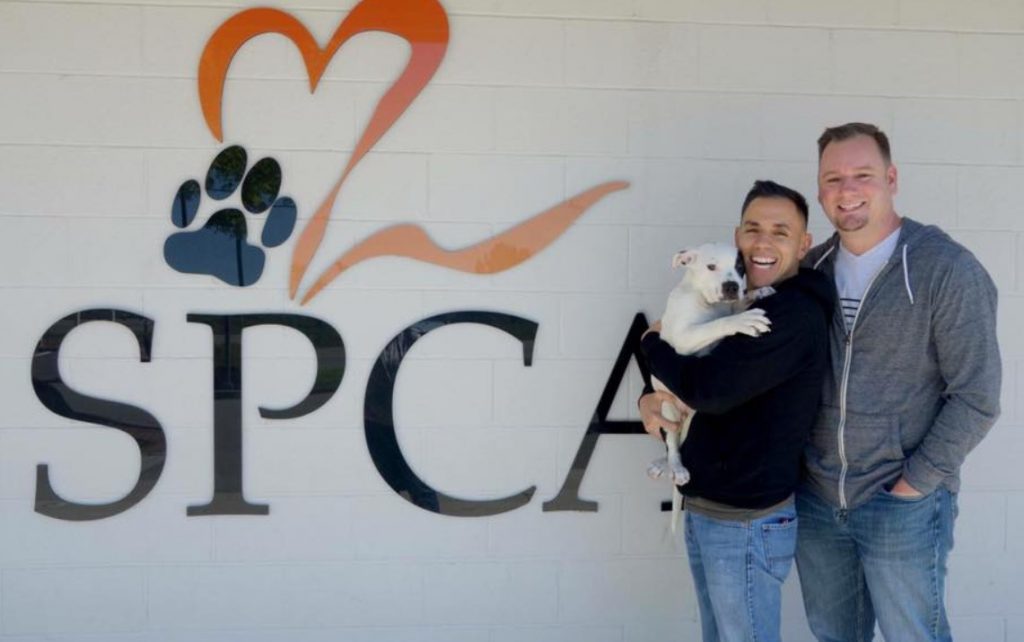 two men adopted a puppy that could not walk