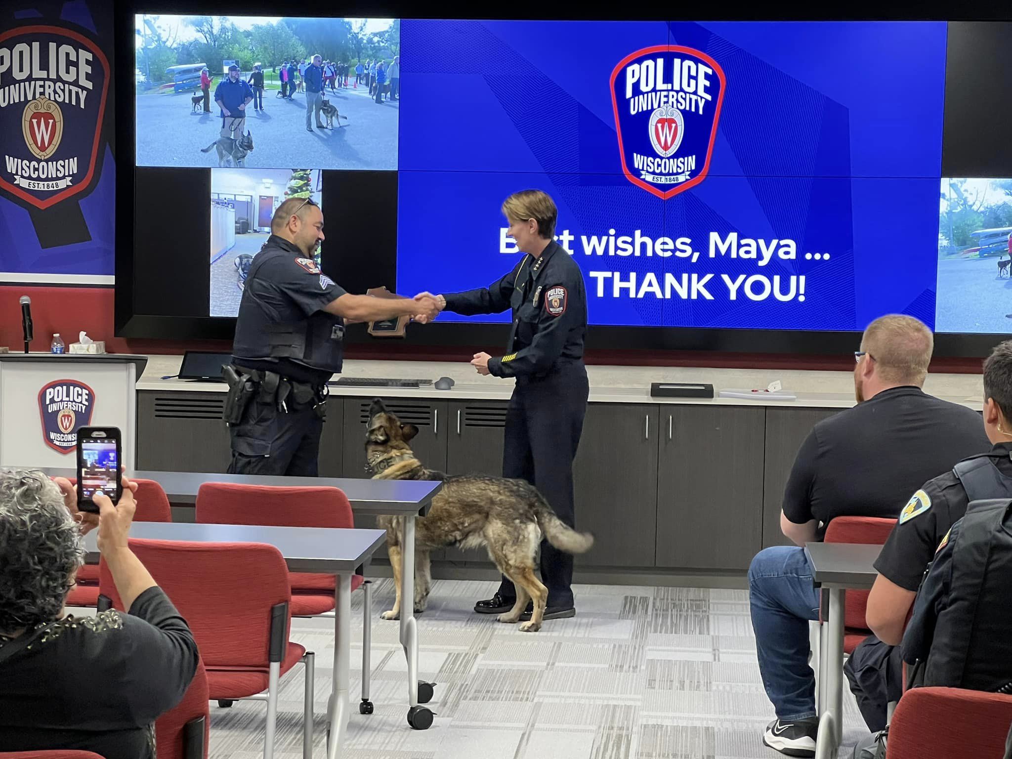 two officers shaking hands