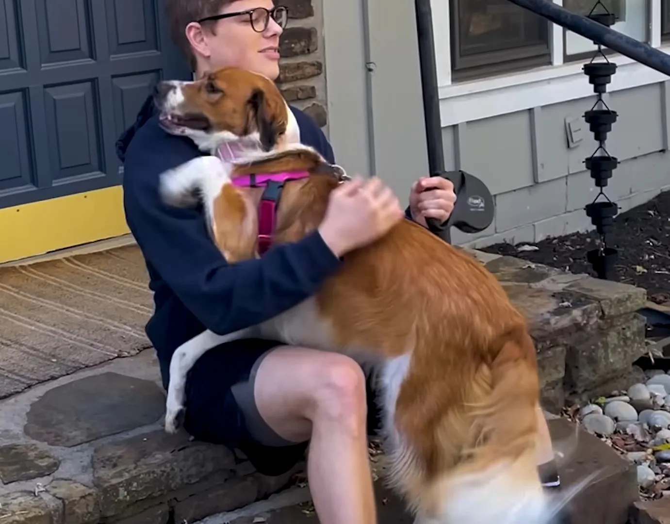 guy and his dog sittting outside