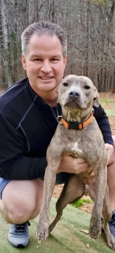 portrait of a man with his dog