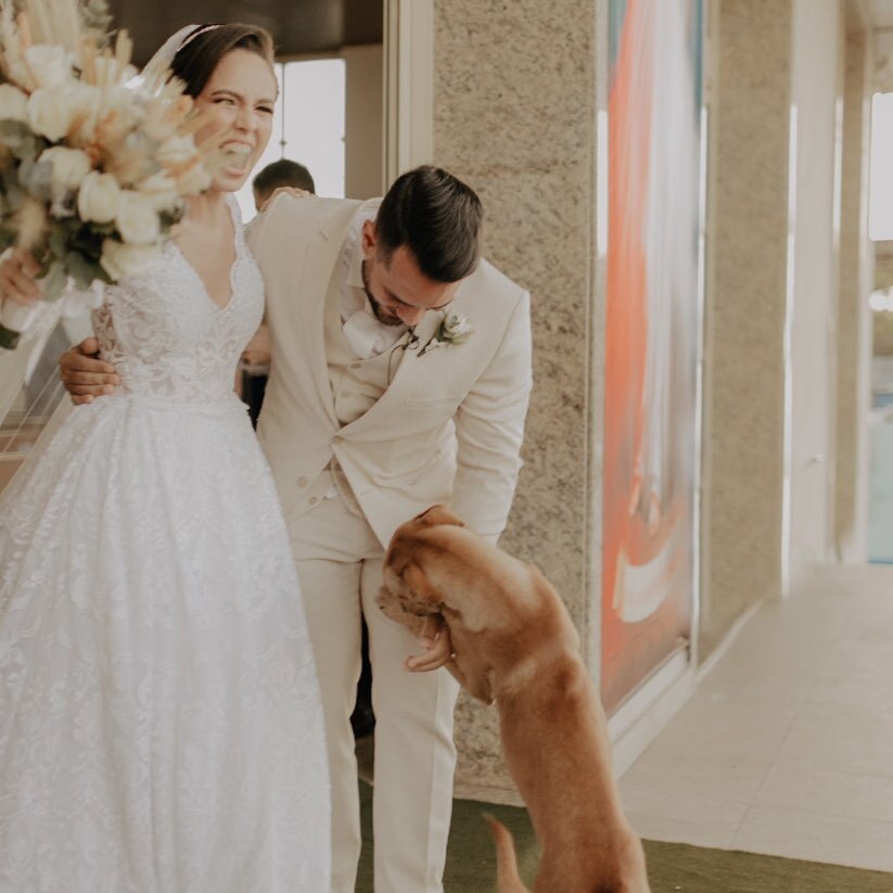 bride and groom with dog