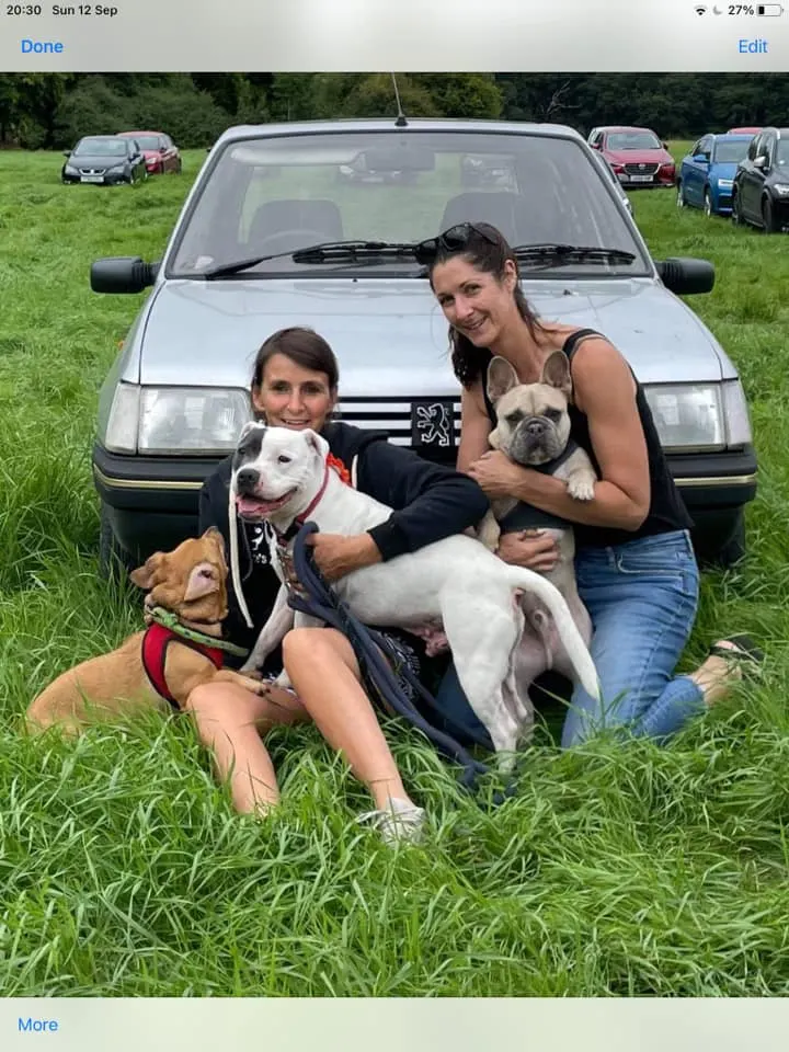 two girls and three dogs