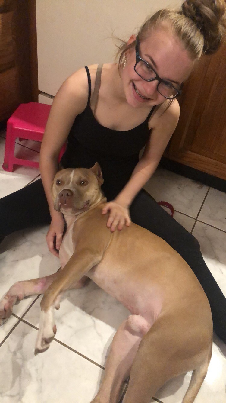 smiling girl with dog