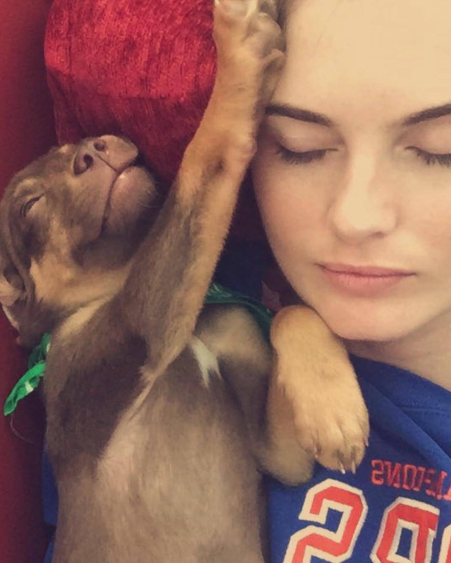puppy sleeps with woman
