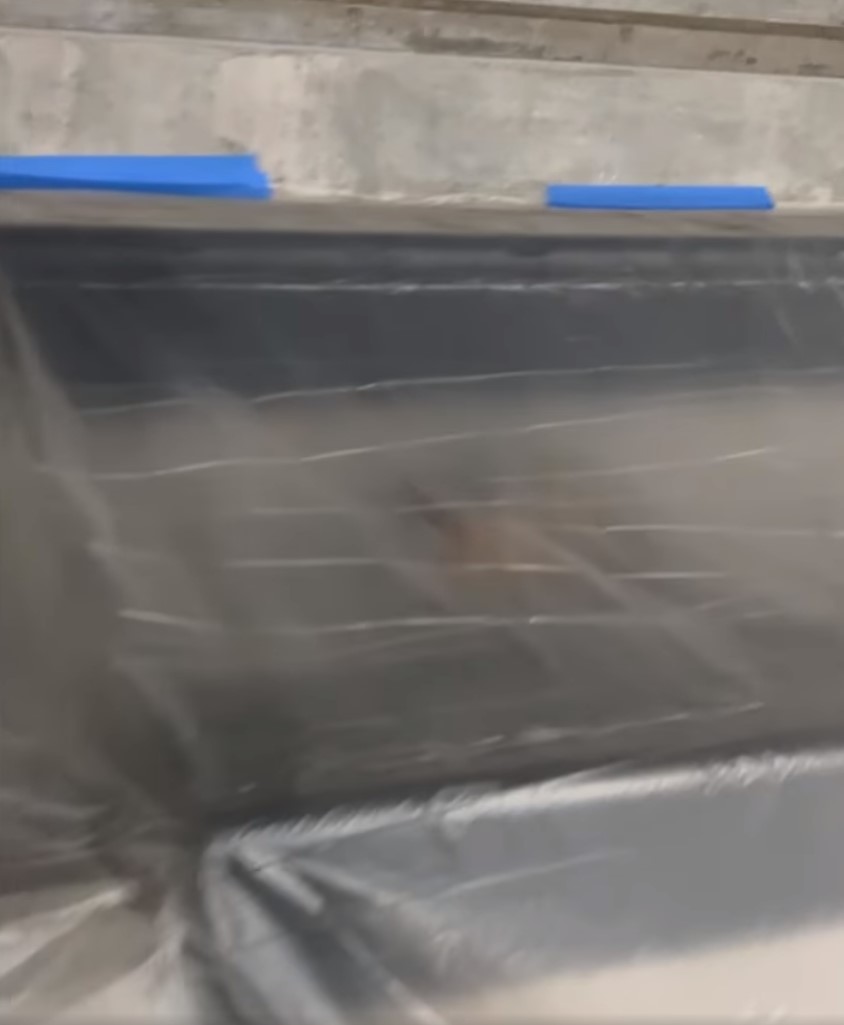 something moving under tarp
