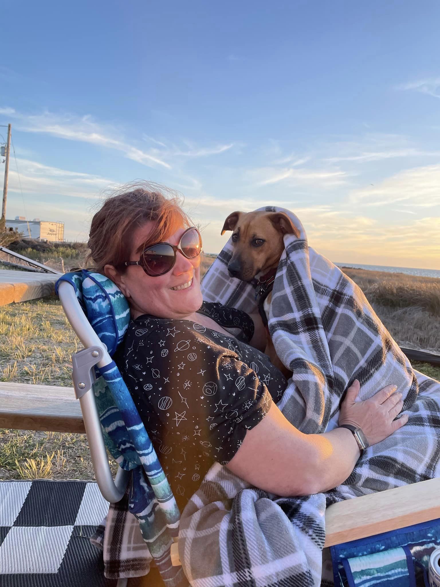 woman, dog and sunset