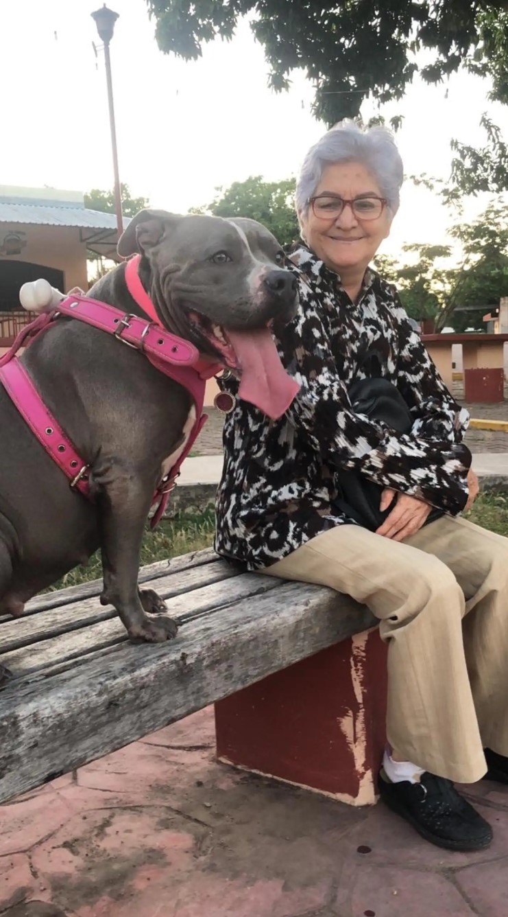 dog with granny in the yard