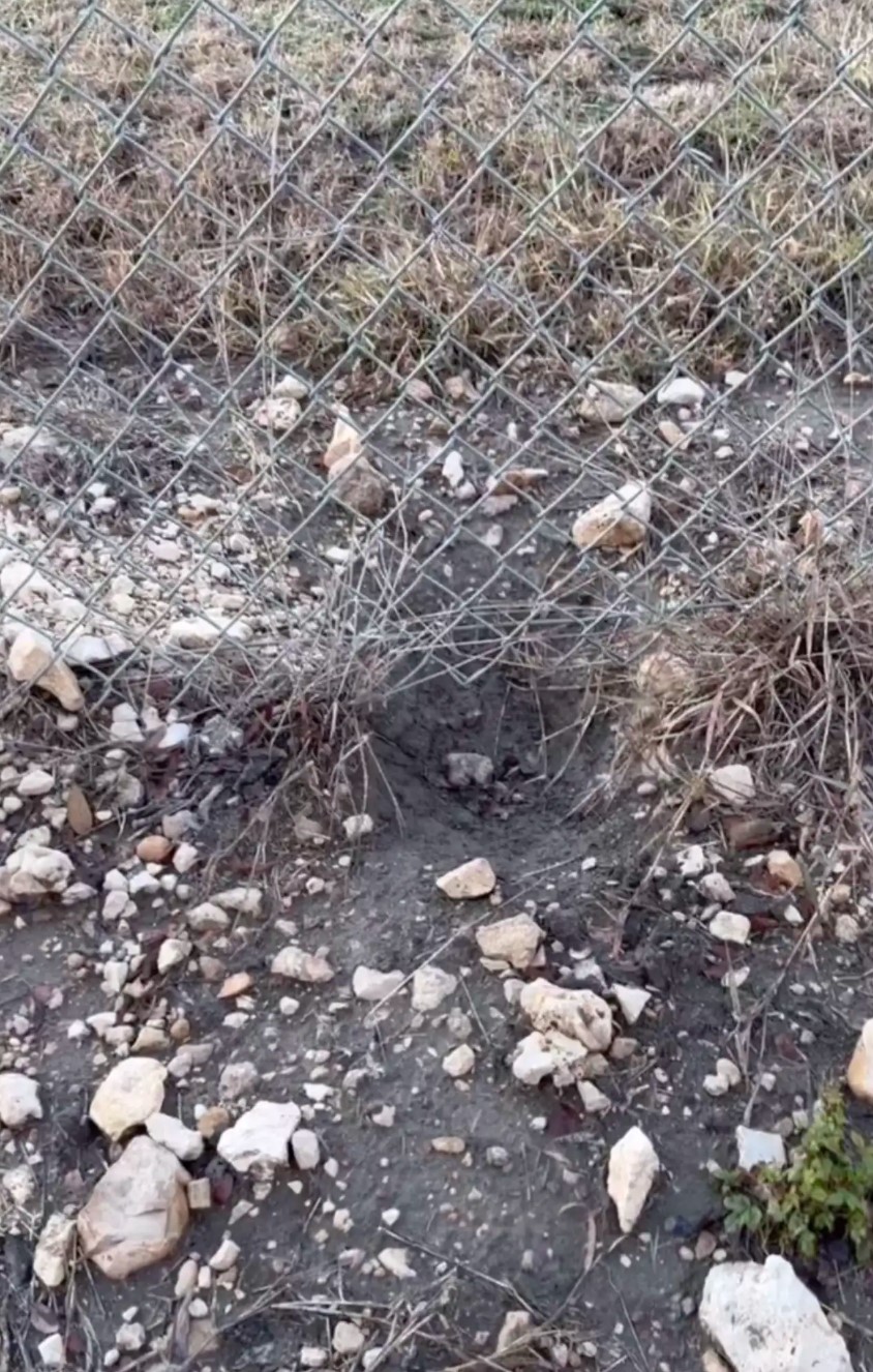 hole under fence