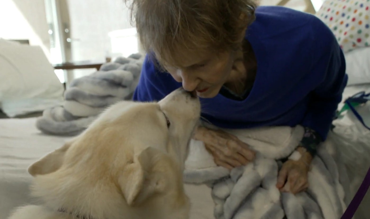 old woman and dog