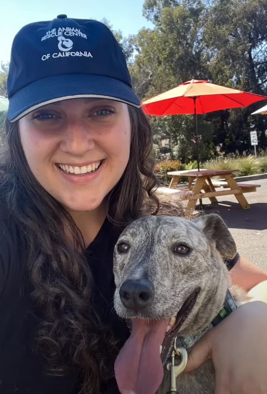 photo of woman and dog outdoors