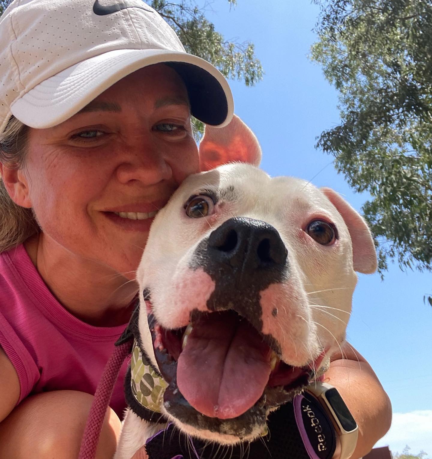 close-up photo of woman and a dog