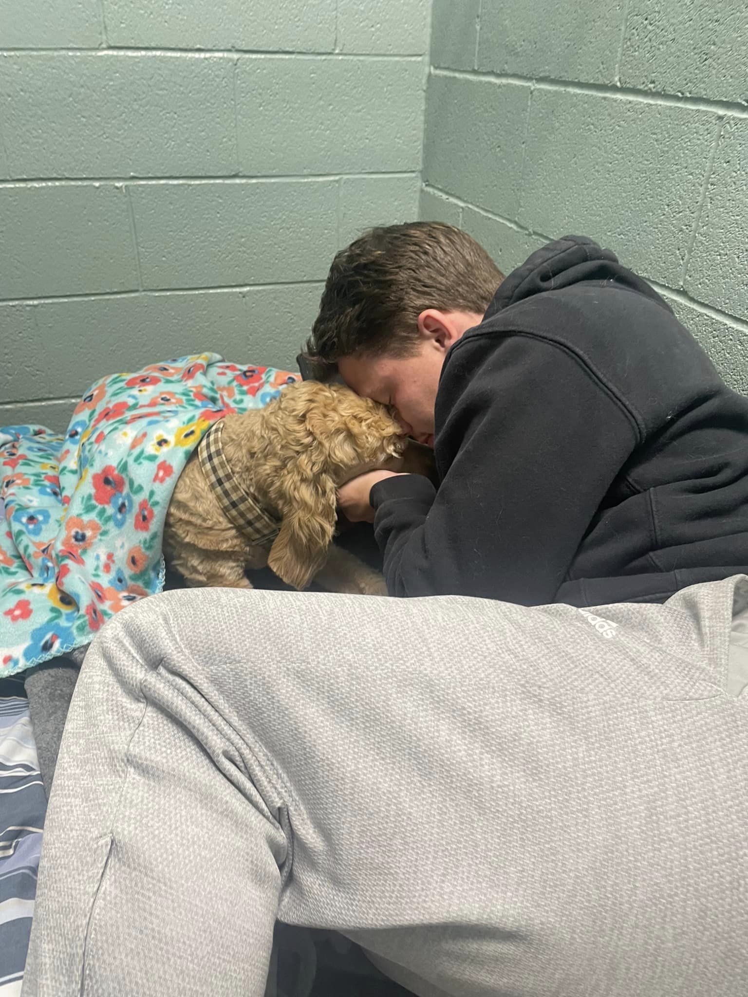 young man and dog