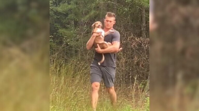 man and scared pup